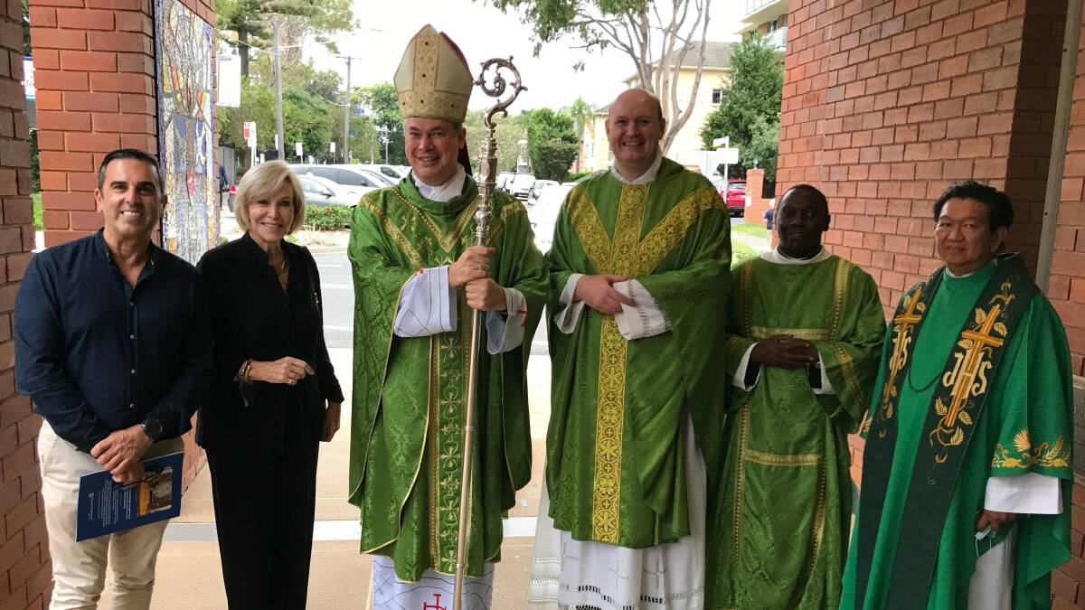 Mayor, Carmelo Pesce, deputy mayor, Carol Provan; Bishop Richard Umbers, Fr James McCarthy at the centenary mass. Picture: supplied