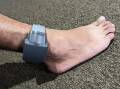 The NSW opposition says ankle monitors would protect alleged DV victims from bailed perpetrators. (Farid Farid/AAP PHOTOS)