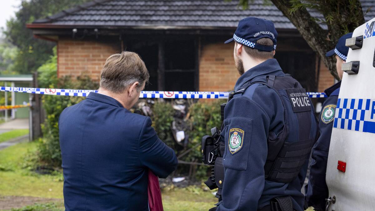 Police at the site of the fatal house fire at Lalor Park in Sydney's west. Picture by AAP Image/Thomas Parrish