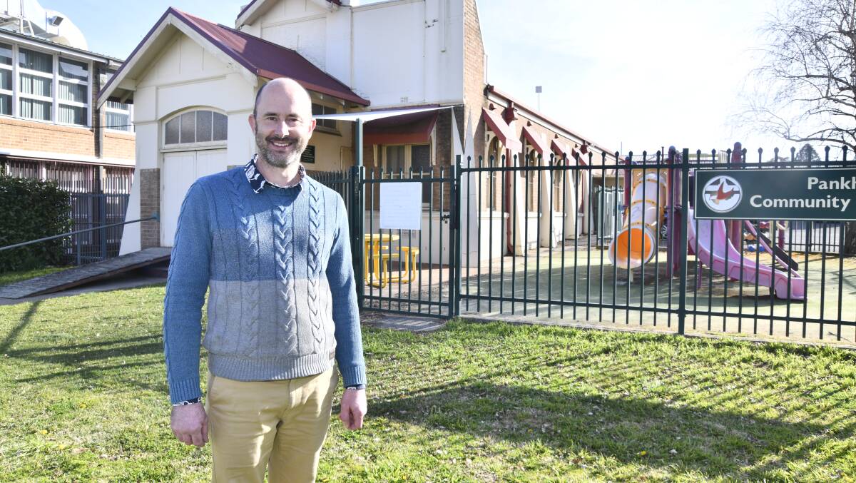 Reverend Andrew Cunningham outside the space to become social housing. Picture by Jude Keogh 