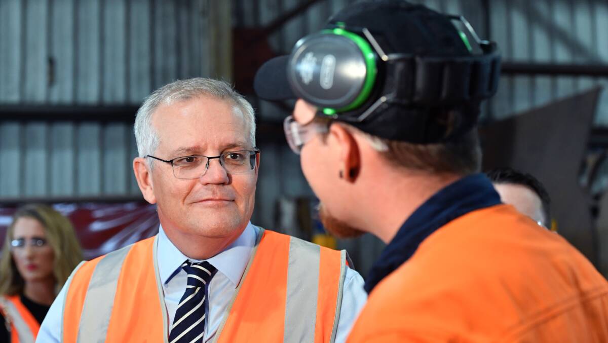Prime Minister Scott Morrison tours a manufacturing plant in Townsville. Picture: AAP