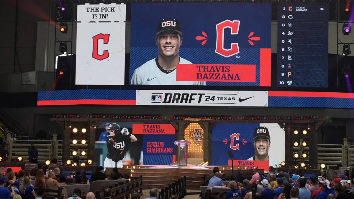 An image of Travis Bazzana is shown on the video board after the Cleveland Guardians selected Bazzana, the first overall pick in the MLB baseball draft. Picture AP