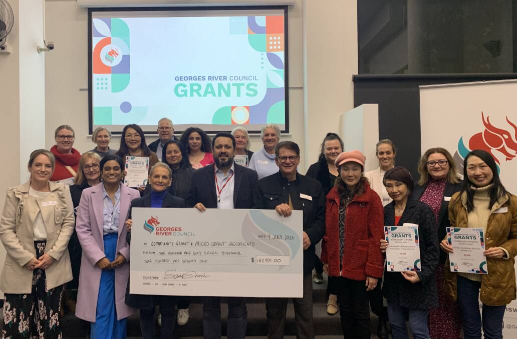 Georges River Mayor Sam Elmir and Councillors, centre, with some of the recipients of Round 2 Georges River Council's Community Grants Program.