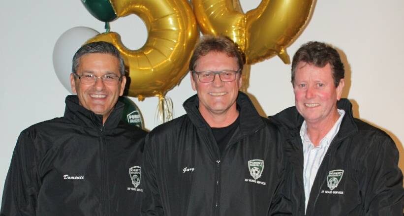 Veterans: Forest Rangers Football Club members Gus Warren, Tim Hooper and Dominic Donofrio celebrate 30 years of service. Picture: Supplied