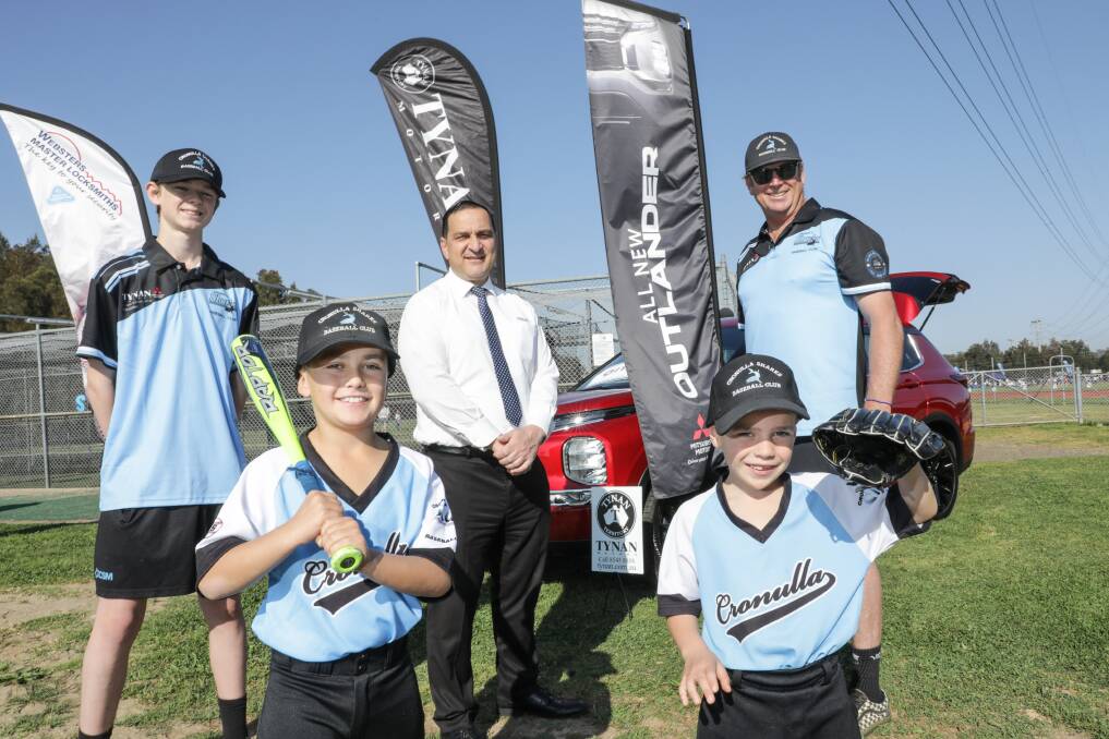 Cronulla Sharks Baseball diamond for the start of the season-new sponsor Tynans with Head Coach Phil Hutt and juniors Flynn and Leo Marney. Picture John Veage