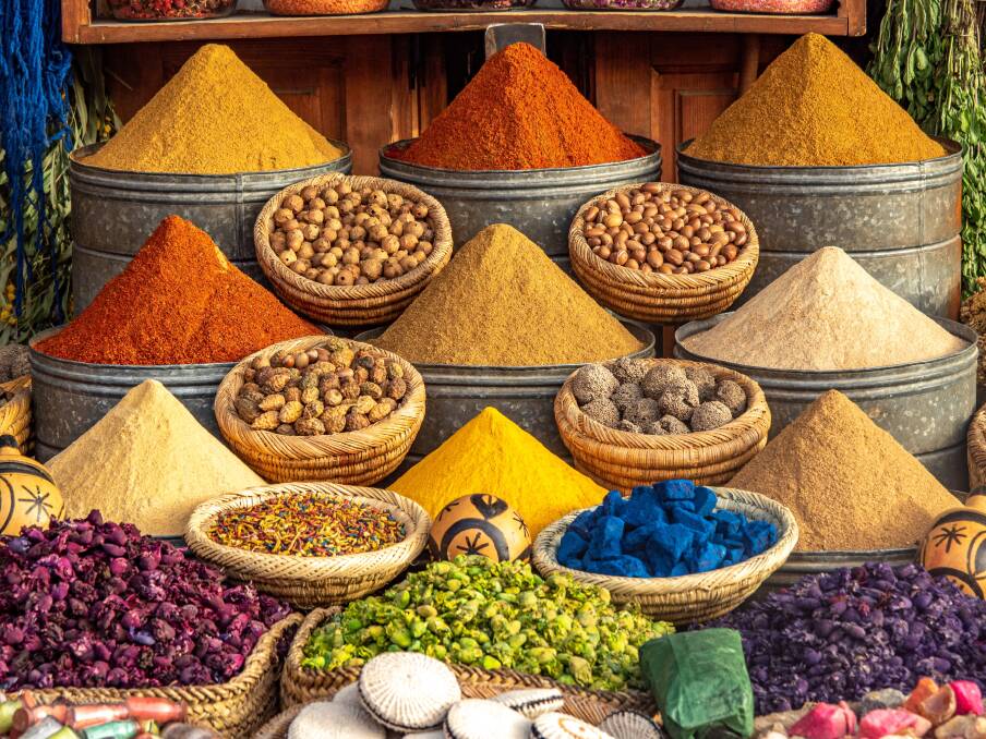 Colorful spices and dyes found at souk market in Marrakesh, Morocco. Picture Shutterstock