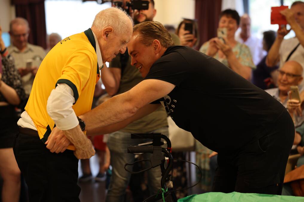 LOVELY GESTURE: Alan Garside, Australia's second oldest living Socceroo got to wear an Australian jersey again thanks to a visit from former star Socceroo goalkeeper Mark Bosnich. Picture: Supplied.