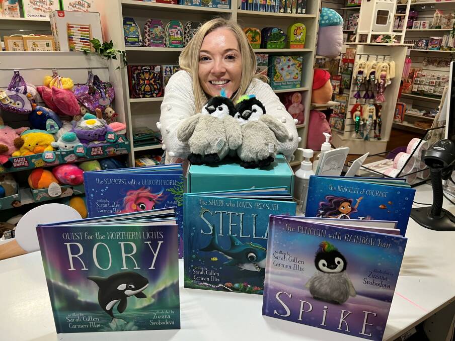 Sutherland Shire author Sarah Cullen with her book series that were inspired by local waterways. Picture supplied