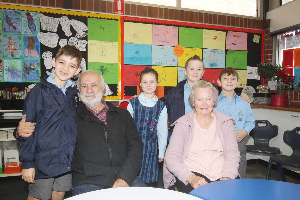 Seniors get to know each other at Our Lady of Fatima Catholic Primary School, Caringbah, as part of an intergenerational program that is being rolled out more widely. Picture by Chris Lane