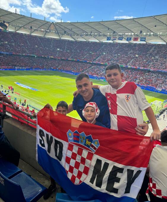 Peakhurst brothers Dominik Jurleta, 7, Filip, 9, Niko, 12, with their dad Daniel Jurleta, support Croatia at UEFA Euro 2024 in Germany. Picture supplied
