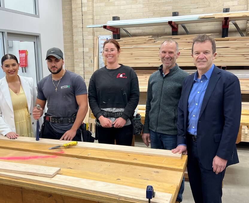 Industry preparation: Carpentry students at TAFE NSW Gymea, which receives a boost to its learning facility. Pictured also, Cronulla MP Mark Speakman and Miranda MP Eleni Petinos.