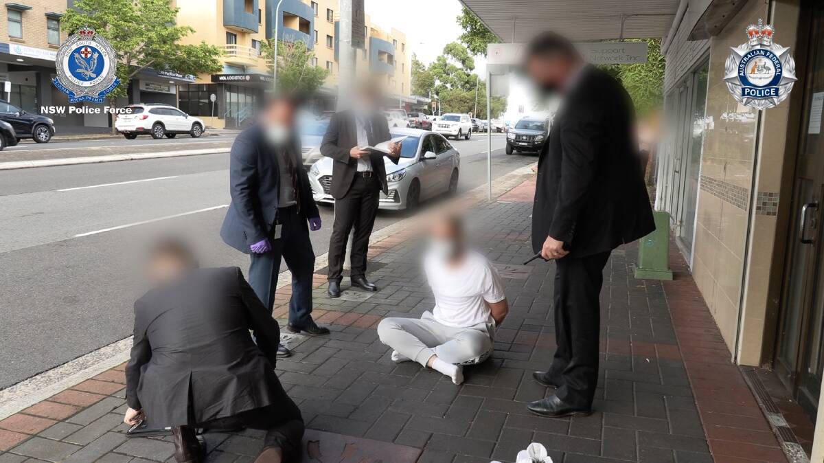 Police arrest a man suspected of terrorism offences. Picture: NSW Police 