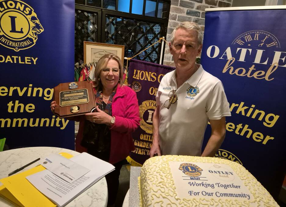 The licensee of Oatley Hotel, Lyn Humphreys has been honoured with the Lions Club International Foundation's Melvin Jones Fellowship Award by the Oatley Lions Club. Club President Richard Sheahan presents the award. Picture supplied