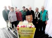 Engadine Home Gardeners' Club celebrates its 70th anniversary. Club President John Hoppitt is pictured with the shield. Picture by Chris Lane