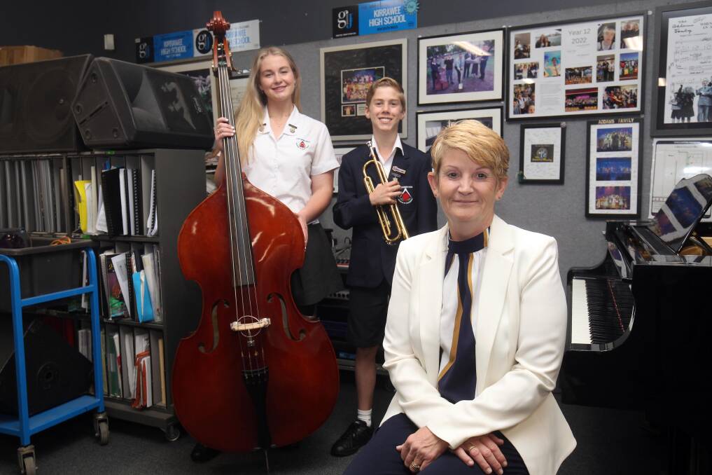 Kirrawee High School year 7 music teacher Kerri-Ann Lacey with year 12 student Abbey Stone and year 9 student William Pearce. Picture by Chris Lane