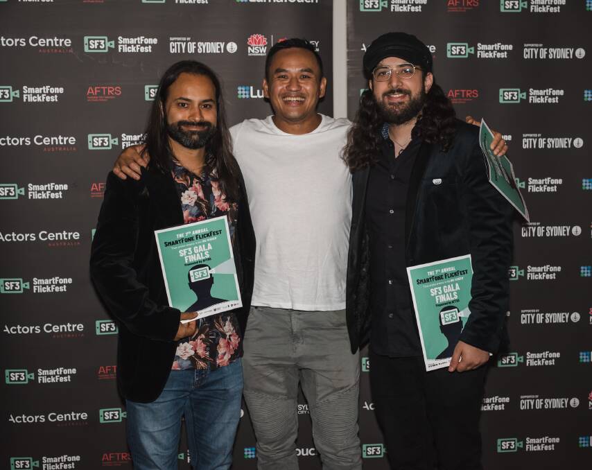 Kenny Foo of Jannali, pictured in the middle, has once again submitted a film into the Smartphone Flick Fest. Picture supplied