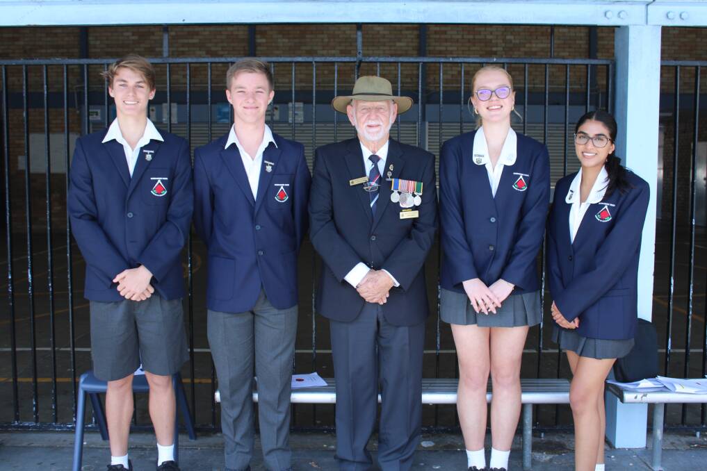 Kirrawee High School students with a representative from Miranda RSL at the school's Remembrance Day ceremony on November 10. Picture supplied