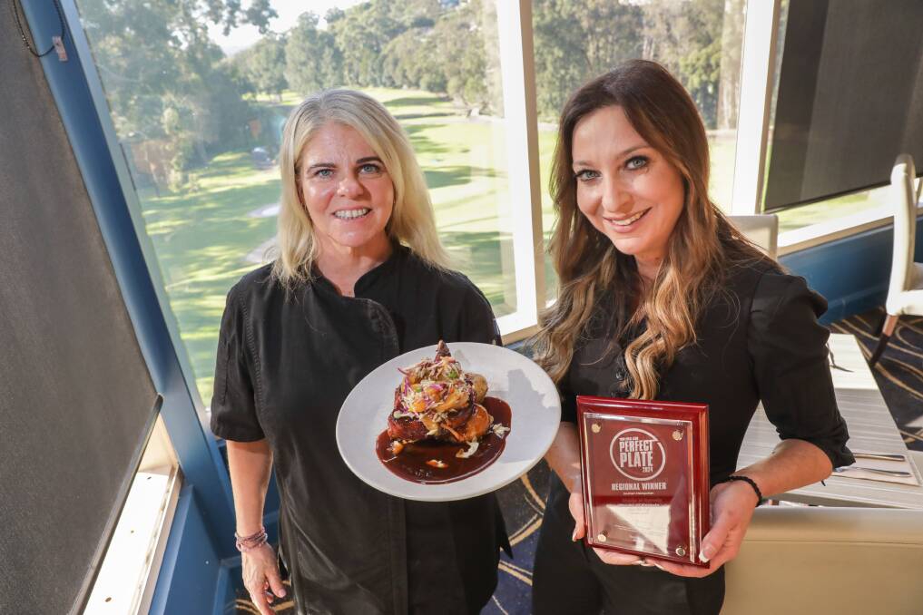 Chef Anita Lisson with Gina Louloudakis, who runs the kitchen at Sharks Kareela Cove Bar & Grill, and the winning regional Perfect Plate dish. Picture by John Veage