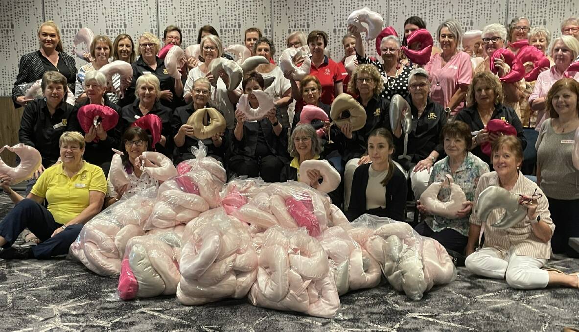 Zonta Botany Bay Club volunteers with the breast cancer supportive cushions. 