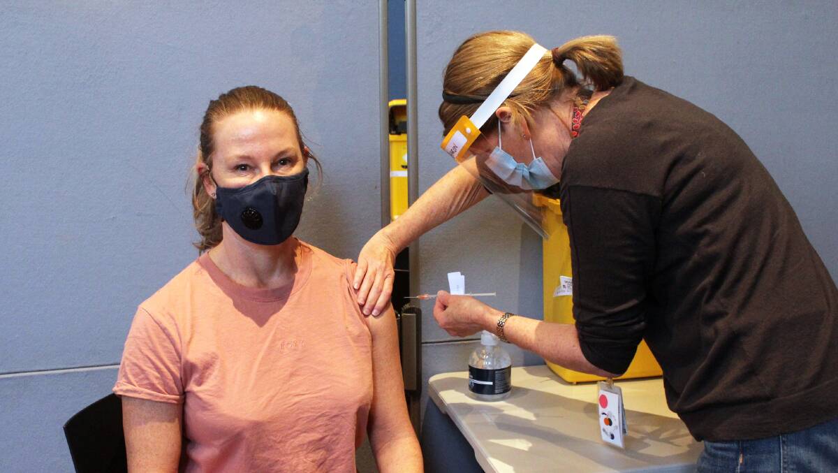Pop-up hubs: Bobbi Mayne gets her jab from Sharon Greentree at Rockdale vaccination hub. 