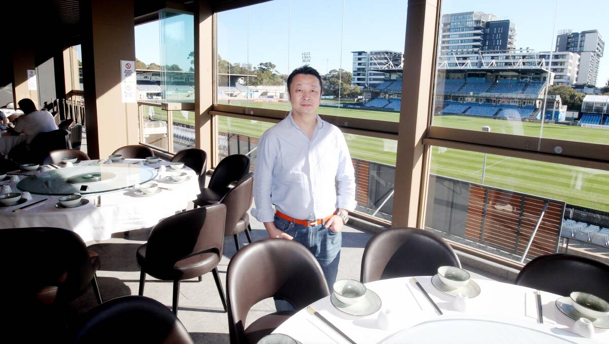 Michael Chau in Golden Bay Asian restaurant overlooking PointsBet Stadium. Picture by Chris Lane