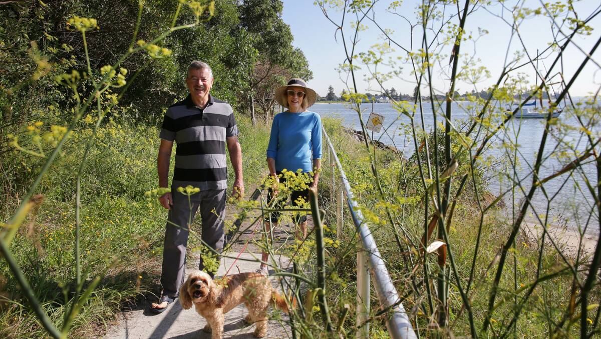 Taren Point residents Pauline and Bob Small have complained for several years about the overgrown and littered walkway. Picture by John Veage