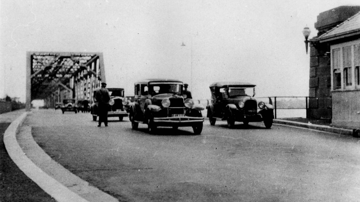 A toll collector on Tom Uglys Bridge, which opened on May 11, 1929. Picture Sutherland Shire Museum / Sutherland Shire Library Local Studies collection 