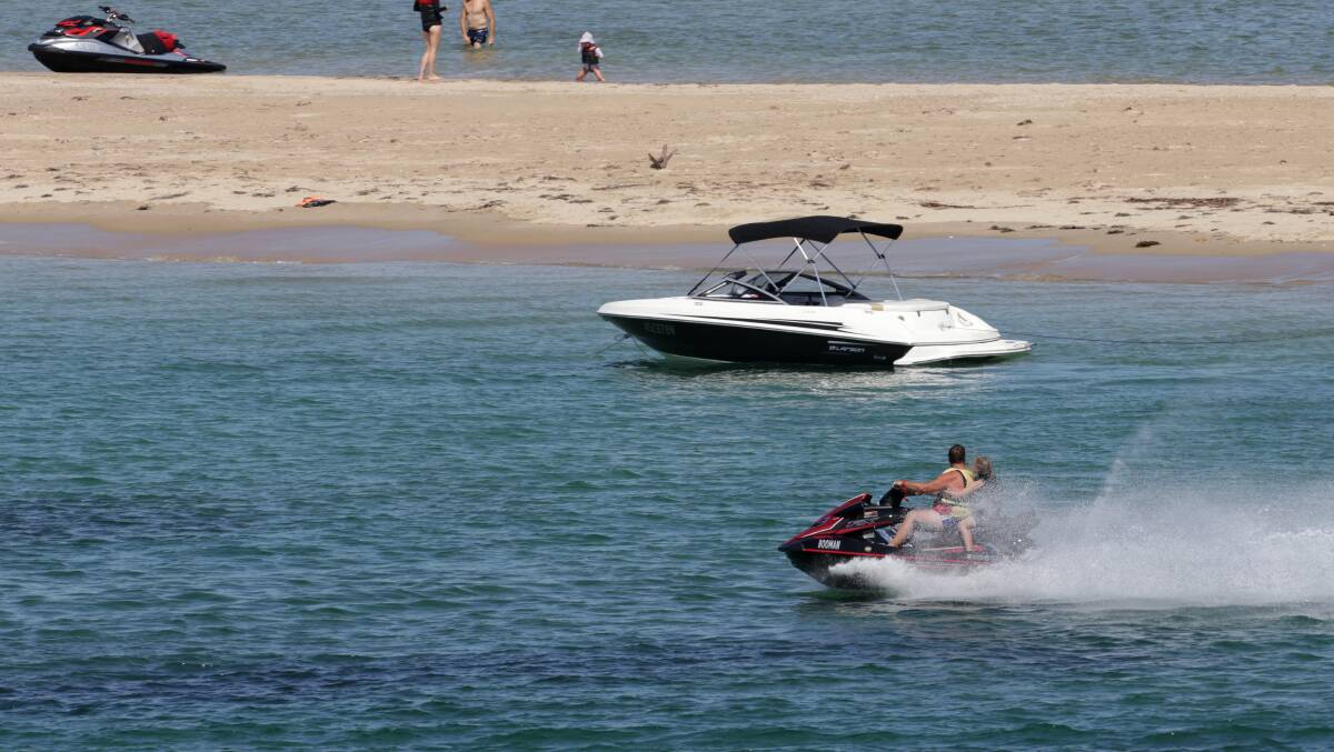 A jet-ski operating within the rules near Deeban Spit in Port Hacking. Picture by John Veage
