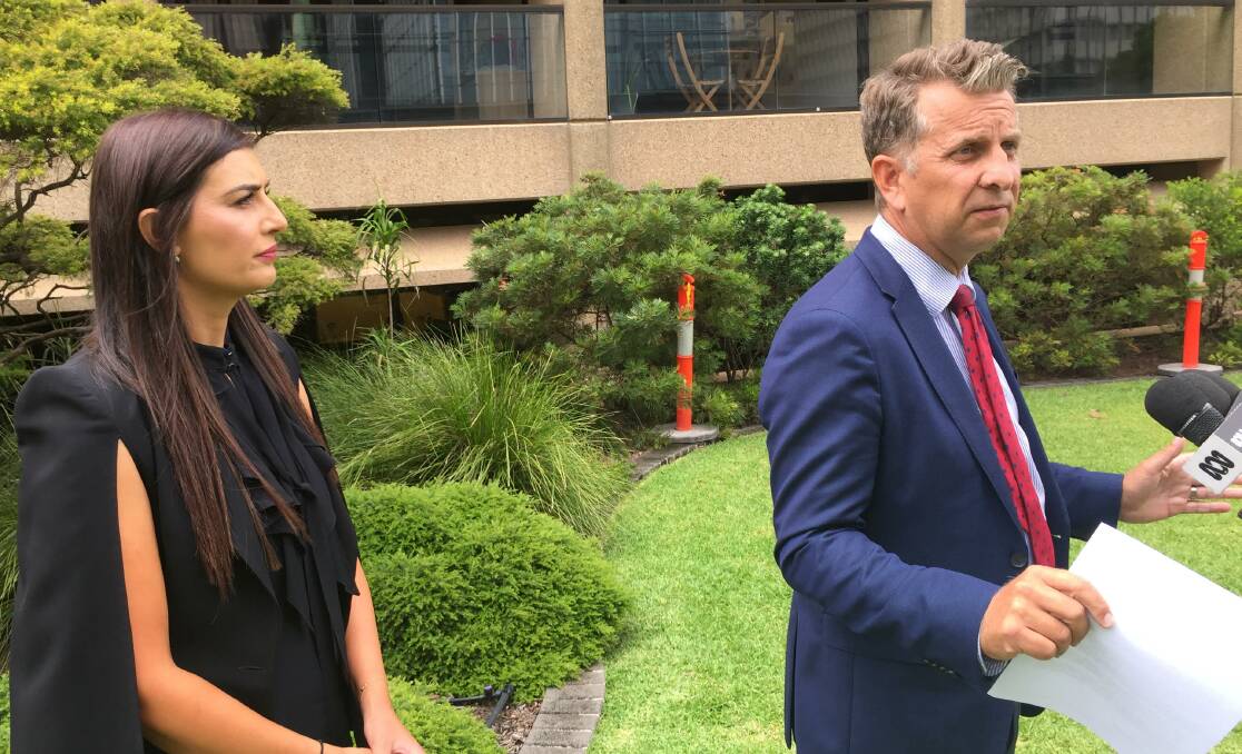 Andrew Constance and Eleni Petinos at a media conference at State Parliament. 