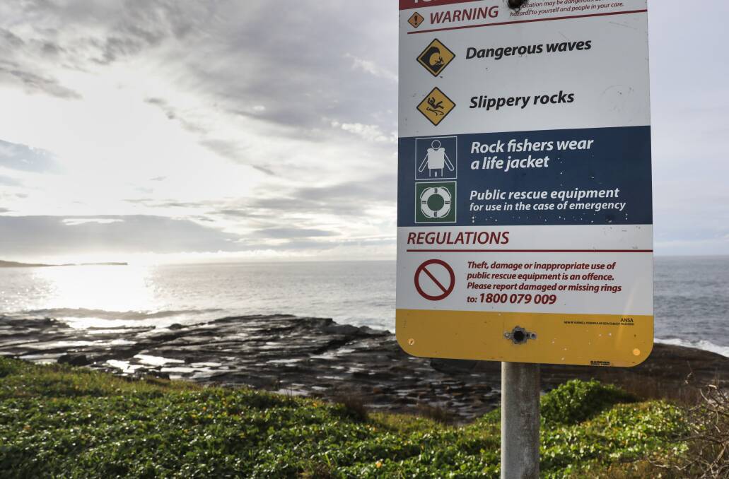 Rock fishing warning sign at Cape Solander. Picture by John Veage
