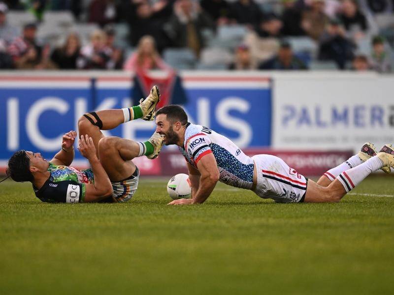 James Tedesco scored two tries to lead the Roosters to a crushing 44-16 win over Canberra. (Lukas Coch/AAP PHOTOS)