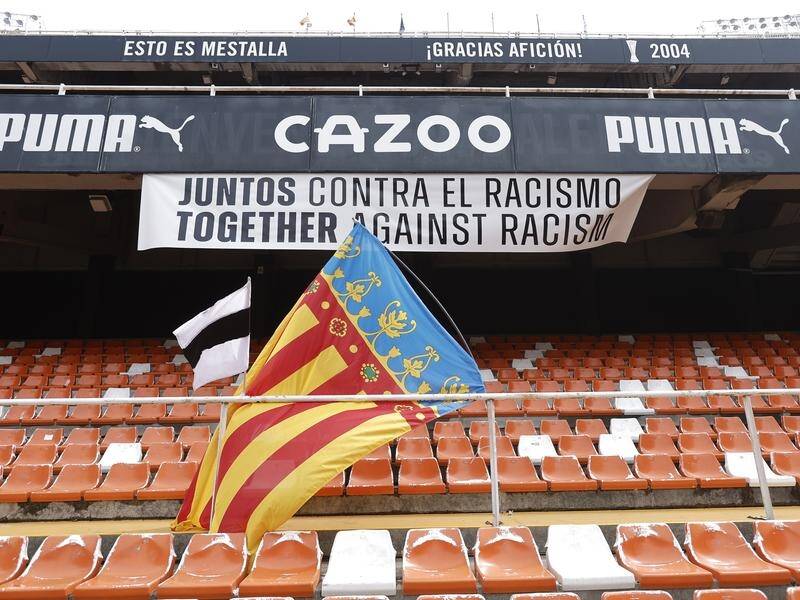 A banner at Valencia's stadium sends a message as Spain's battle against bigotry continues (EPA PHOTO)