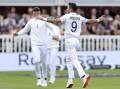 Jimmy Anderson celebrates one of his four wickets in his final Test against West Indies at Lord's. (AP PHOTO)