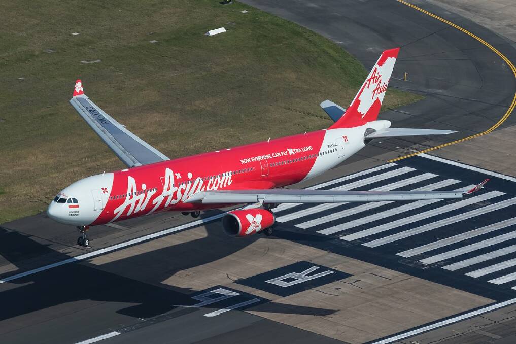 Touchdown: The first AirAsia X flight to Sydney arrives.
