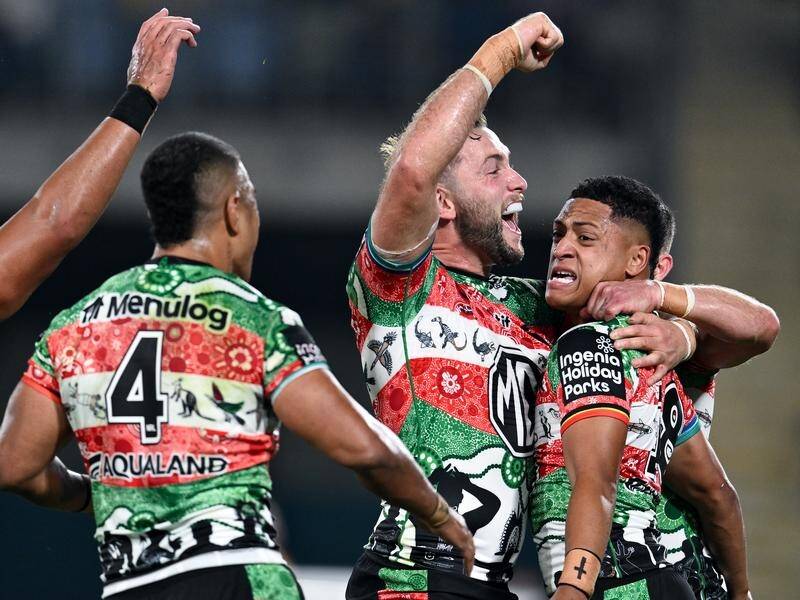 The Rabbitohs celebrate their first win in almost two months after beating the Eels 42-26. (Steven Markham/AAP PHOTOS)