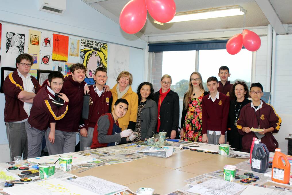 Talent revealed: Ping Lian Yeak (centre) with Kogarah High School students and teachers.