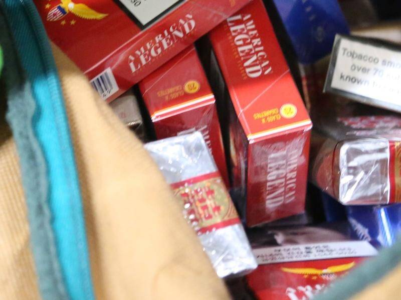 Raids at homes and storage units in southeast Qld have netted illegal cigarettes, vapes and cash. (PR HANDOUT IMAGE PHOTO)