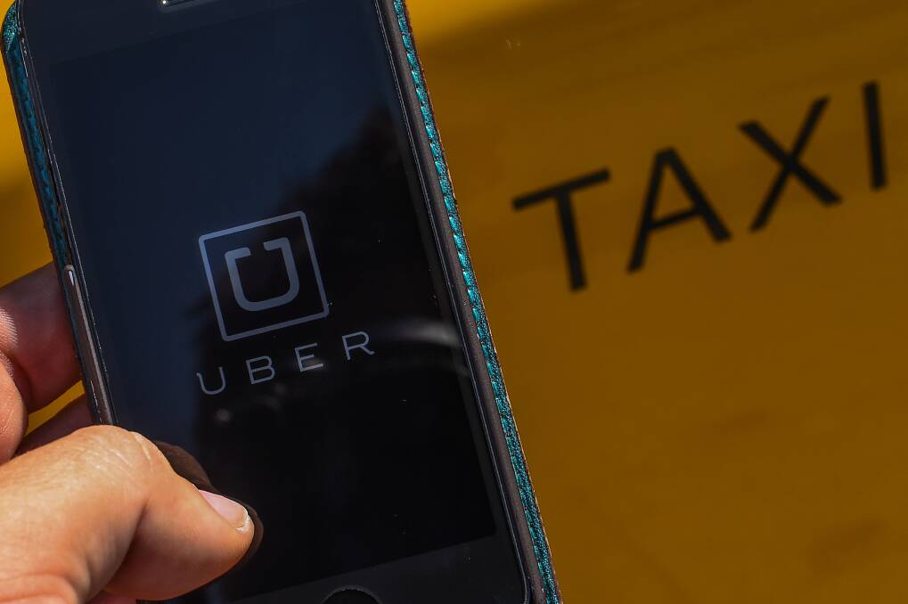 Taxis hit back: Granville taxi company Premier Cabs have hit back a recent report praising ride-sharing app Uber. Picture: David Ramos/Getty Images