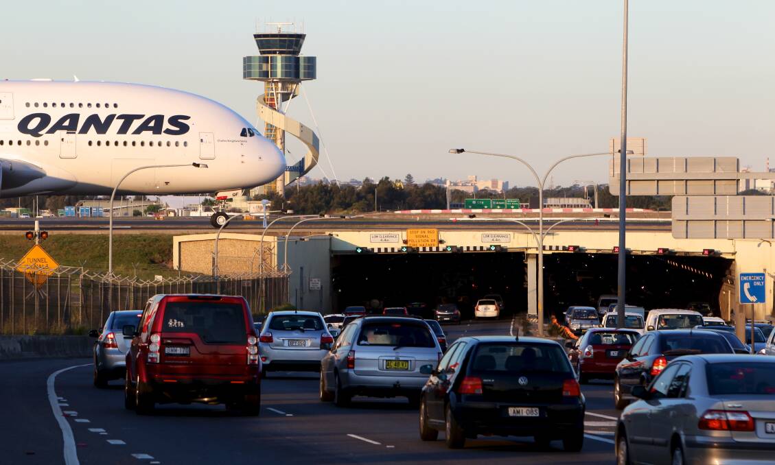 Sydney International Airport as peak hour traffic heads along Southern Cross Drive.Photo by: Dallas Kilponen