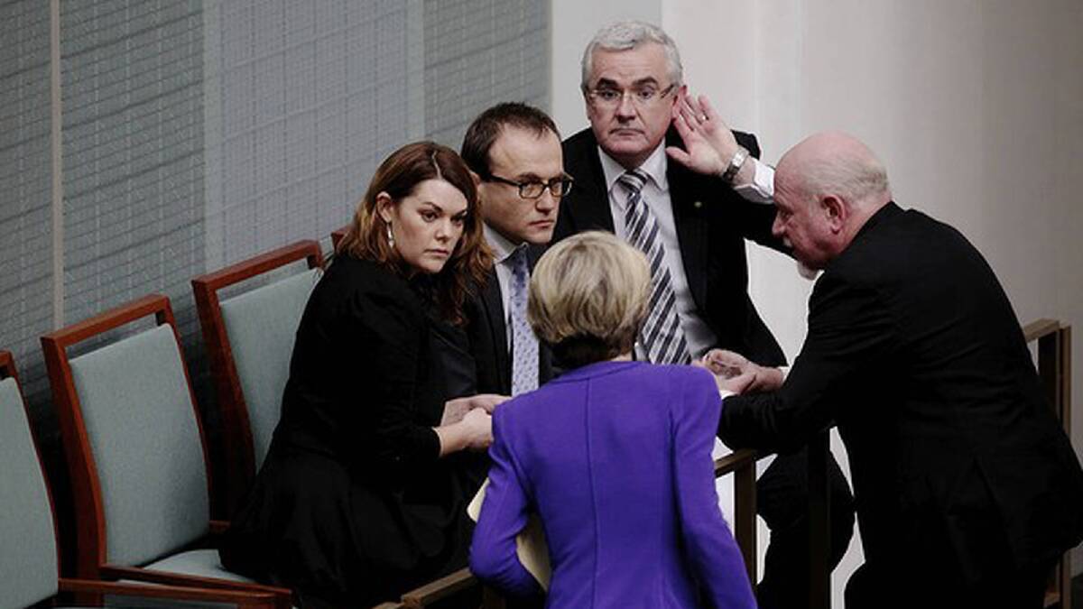 Migration matters. Andrew Wilkie consults Julie Bishop Senator Sarah Hanson-Young Adam Bandt and Mal Walsher on migration bill amendments in June. Photo: Alex Ellinghausen