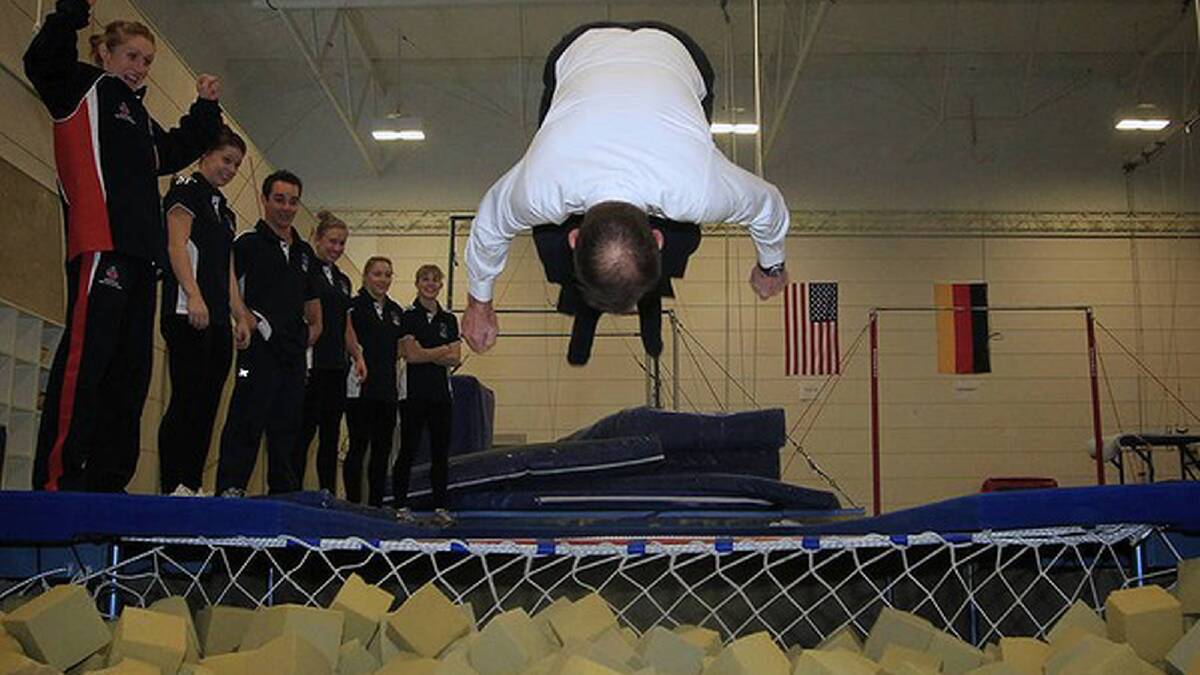 Opposition Leader Tony Abbott flipped into a foam pit in June. Photo: Andrew Meares