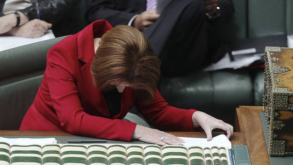 Prime Minister Julia Gillard reacts to Shadow Treasurer Joe Hockey moving to suspend standing orders in October. Photo: Alex Ellinghausen