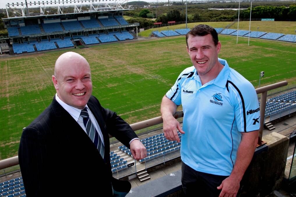 Happier times: Damian Irvine (left) with skipper Paul Gallen. Picture:  Edwina Pickles.